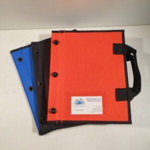 Three notebooks with a handle and two of them are orange.