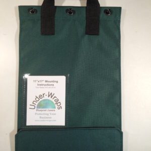 A green bag with a card holder on top of it.