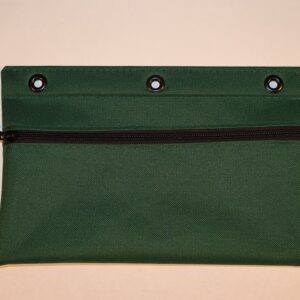 A green bag with three holes on the front.