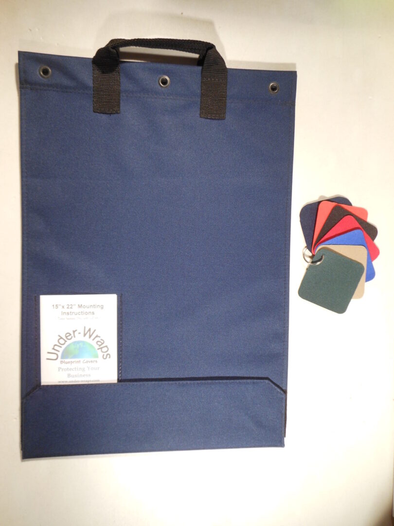 A blue bag with some cards on it
