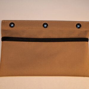 A tan bag with three black buttons on the side.