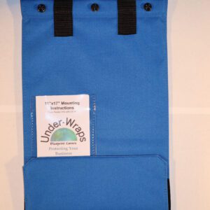 A blue bag with black handles and a label.